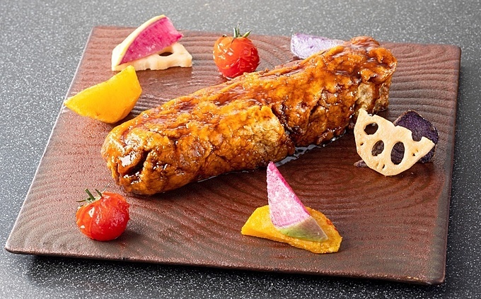 渋谷ストリーム12Fの中華料理店 『Gu-O』の「三元豚の一本揚げ 黒酢ソース」画像